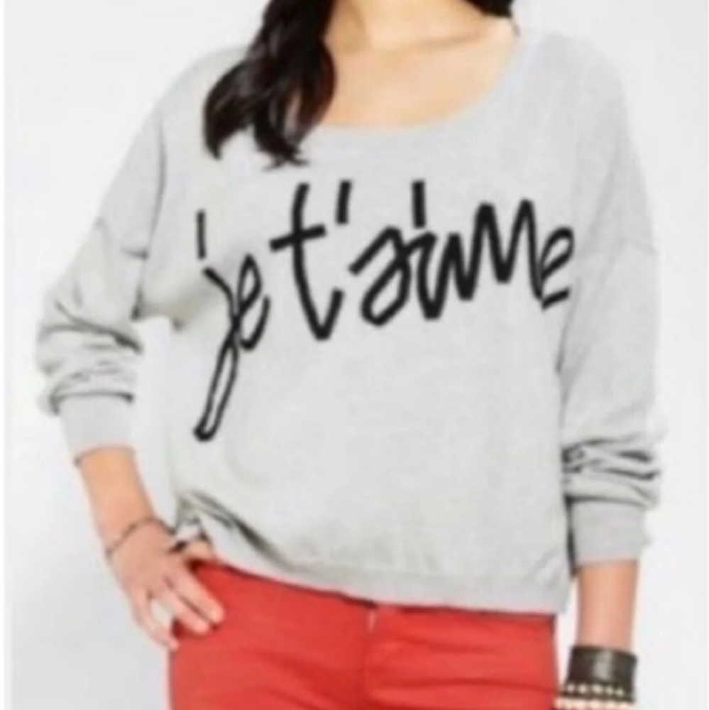 Sparkle & Fade Phrase Sweater At Urban Outfitters.